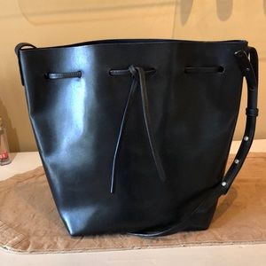 Black leather Mansur Gabriel bucket bag with RARE blue interior